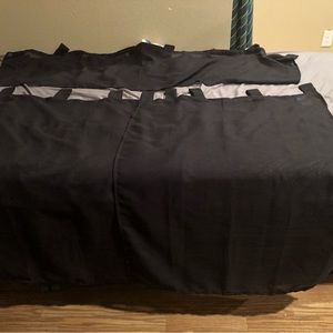 Two 28” x 36” sheer curtains with a 56” x 14” sheer valance in black￼